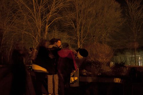 Greg Barker shows one the night's deep-sky targets to a girl scout at the Smith Library in North Branford.