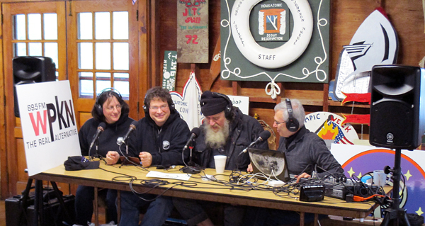 The live WPKN radio program. Speaking here, from left to right are Cheryl Barker, Greg Barker, Bob Carruthers, and host Andy Poniros.