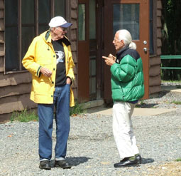 Photo by Leo Taylor
Alan Sacherow and Jhn Dobson outside the meeting hall during a chilly Sunday morning.
