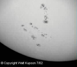 Photo by Walt Kupson
Sunspots AR10050, 10039, 10044 (l to r)
Taken by Walter Kupson 3/02
Celestron 4.5" Reflector, Canon S30 digital camera, 1/100 sec, f/4.9

