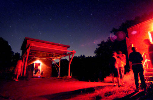 Photo by Alan Chaniewski
Both observatories bathed in red light, are open and have been recieving guests for the past several hours.
