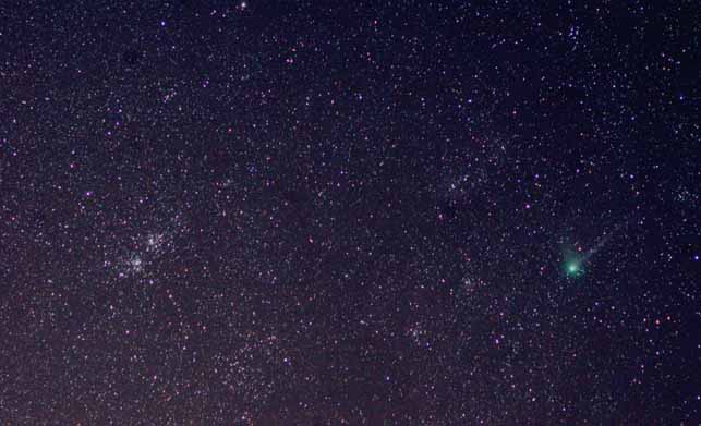 Photo by Alan Chaniewski
Comet Machholz near Double Cluster taken with a Nikon D100, 4.5 minute exposure, 105mm Lens.

