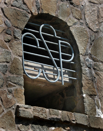 Photo by Richard Gresham
Rich Gresham spotted the CSP letters on the oberservation building on top of Mt. Carmel during a hike on July 12, 2009, at the Summer Solstice Picnic. Could it be they had a Ct. Star Party up on the mountain decades ago? Or, does it mean Connecticut State Park?
