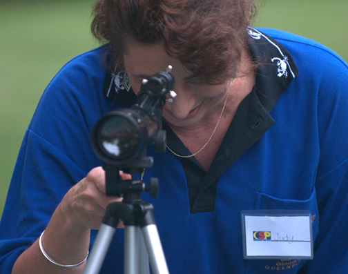 Photo by Alan Chaniewski
One of the backpack telescope winners at the raffle tries out her new scope.
