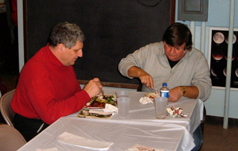 Photo by Leo Taylor
Winter Solstice party 12/13/08 - Mike and Joe get down to some serious eating of the great food!
