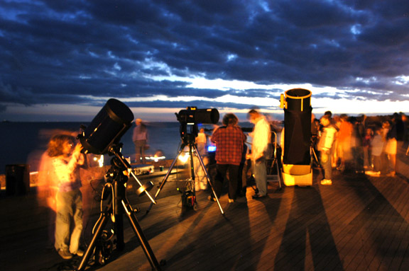 Photo by Alan Chaniewski
Observing on the deck under partly cloudy skies September 10, 2006.
