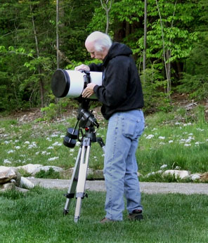 Photo by Leo Taylor
Marty Conners clamps his Meade 8" reflector together at the Hidden Lake Observatory.
