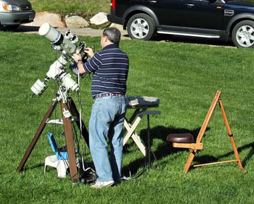 Photo by Leo Taylor
Neil Fleming adjusts his 4 inch Zeiss refractor with a SBIG STL6303 camera.
