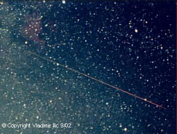 Perseid meteor taken by Vladimir Ilic
North America Nebula NGC7000 can be seen in upper left
Taken 8/13/02 from Mohawk Mountain
Vivitar 3800N 50mm F1.7 lens, Kodak 800 Max 10 min with Barn Door Tracker
