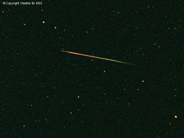 Perseid meteor taken by Vladimir Ilic
Taken 02:22-02:24 8/14/02 from Mohawk Mountain
White bright star above spear head is Gamma Camelopardalis
Olympus OMG, 50mm F2.8 Lens, Kodak HD400, 2 min

